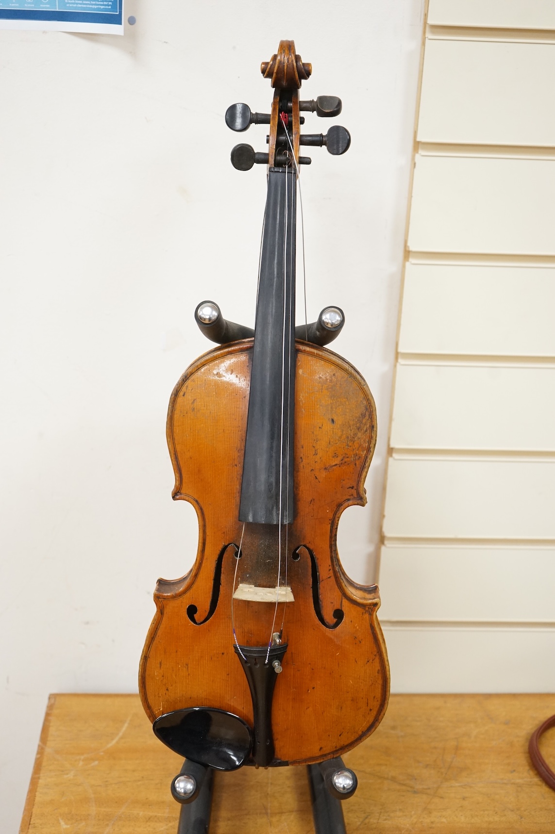A cased late 19th century violin, Stradivarius copy, with two bows, one fully mounted and signed Roger Lotte, CITES Submission reference, RSF8HBLC